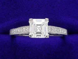 0.94 carat Asscher Cut diamond with H color and VS1 clarity in a Tacori mounting with 0.32 total carat weight of diamonds