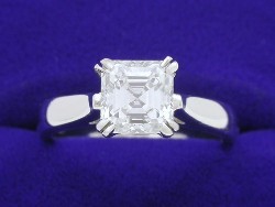 1.18 carat Asscher Cut diamond ring with H color, VS1 clarity Asscher in platinum cathedral-style mounting.