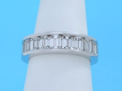 Channel set emerald cut diamond eternity band