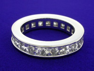 Platinum channel set princess diamond eternity band