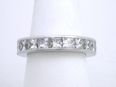 Diamond Wedding Band: 5.06 tcw Princess Cut Channel Set Diamond Eternity Band