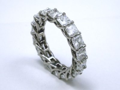 18 shared-prong set square radiant cut diamonds