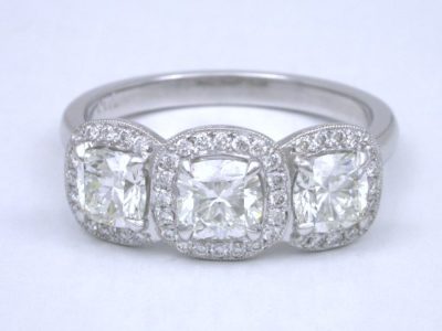 Cushion-Cut Three-Stone Diamond Ring with Squarish Cushion Cushion Diamonds