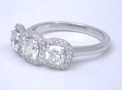 Three-Stone Cushion Cut Diamond Ring