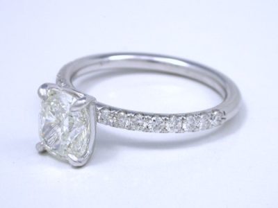 Cushion modified brilliant diamond in 18-karat white-gold mounting