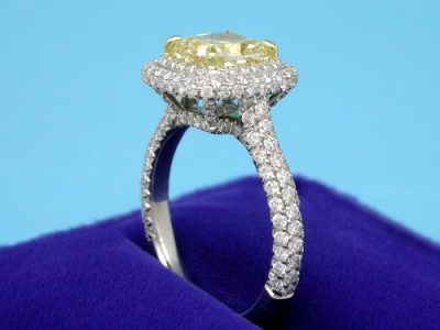 Cushion Cut Diamond Ring with Fancy Yellow Color Diamond and Pave Mounting