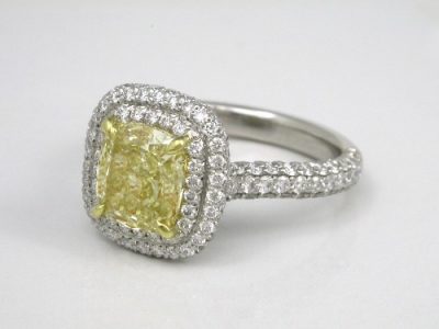 Cushion Cut Diamond Ring with Fancy Yellow Diamond Surrounded by Double Pave Halo and Pave on Top and Sides of Shank