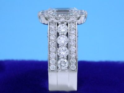 Emerald Cut Diamond Ring: 1.20 carat with 1.35 ratio and 1.42 tcw Round Diamonds