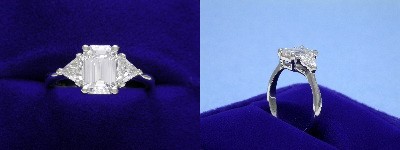 Emerald Cut Diamond Ring: 1.26 carat with 1.47 ratio in 0.49 tcw Trillion Three Stone mounting