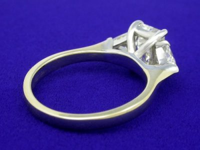 Emerald Step Cut and Trillion Diamond Three Stone Ring