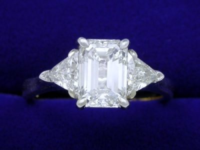 Emerald Cut 1.32 carat H VS1 with 0.46 tcw Trillion Side Diamond Ring