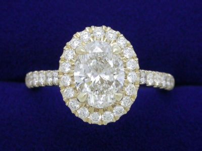 Oval Cut Diamond Ring: 0.91 carat 1.36 ratio 0.39 tcw pave 14-karat yellow-gold
