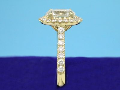 Oval Cut Diamond Ring: 0.91 carat 1.36 ratio 0.39 tcw pave 14-karat yellow-gold