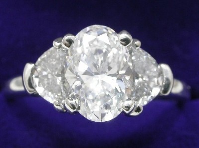Oval Cut Diamond Ring: 1.08 carat 1.43 ratio with 0.60 tcw Crescent Moon diamonds