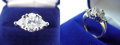 Oval Diamond Ring: 1.20 carat in 0.64 tcw Trillion Cut diamond three-stone mounting