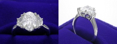 Oval Diamond Ring: 1.32 carat with 1.38 ratio in 0.45 tcw Crescent Moon Cut diamond three-stone mounting