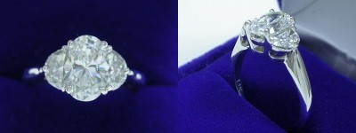 Oval Diamond Ring: 1.51 carat with 1.46 ratio in 0.68 tcw Half Moon Cut diamond three-stone mounting