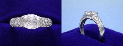 Oval Diamond Ring: 1.54 carat with 1.35 ratio in 0.50 tcw Pave and Half Bezel mounting