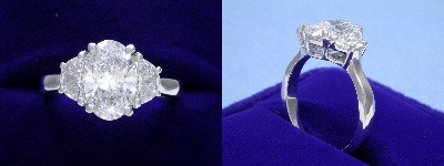 Oval Diamond Ring: 1.78 carat with 1.52 ratio in 0.74 tcw Crescent Moon Cut diamond three-stone mounting