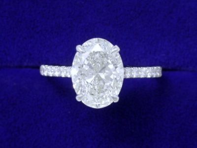 Oval Cut Diamond Ring: 2.01 carat with 1.34 ratio 0.46 tcw pave Diamonds