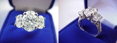 Oval Diamond Ring: 2.01 carat with 1.50 ratio in 1.40 tcw Oval Cut diamond three-stone mounting