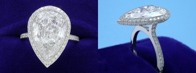 Pear Cut Diamond Ring: 5.27 carat with 1.45 ratio in 0.70 tcw Pave Knife-edge Halo and on Top of Shank Mounting