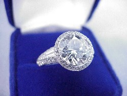 3.25 carat Round Diamond graded I color SI1 clarity in Bez Ambar designer pave mounting 