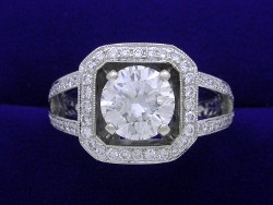 1.78 carat Round Brilliant cut diamond graded H color and VVS2 clarity set in a custom platinum and pave diamond mounting.