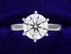 2.01 carat Round Brilliant Cut diamond graded G color and SI1 clarity in a six prong mounting