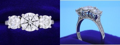 Round Diamond Ring: 1.00 carat with 0.80 tcw Round Sides and 0.14 tcw Pave