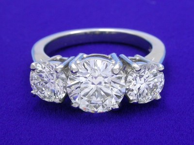 Special Offer: Round cut 1.52 carat I VS2 with 1.19 tcw Round Three-Stone Ring