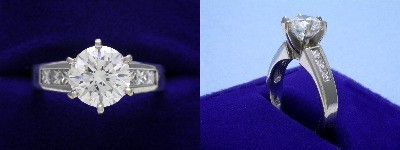 Round Diamond Ring: 1.70 carat with 0.41 tcw Princess Diamonds in mounting