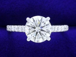 Round cut 1.80 carat I SI1 in 0.26 tcw Pave Ring