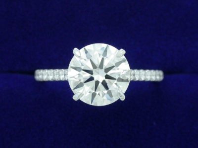 Round Diamond Ring: 2.10 carat with 0.30 tcw U-Set Round Brilliant Diamonds