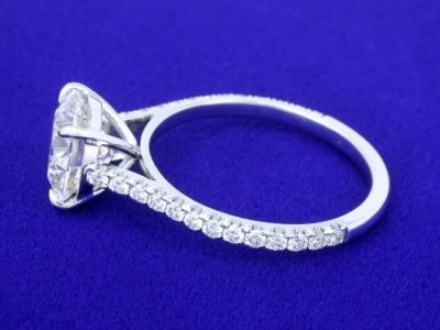 Custom 18-karat white-gold mounting with 26 French cut pave set round brilliant cut diamonds