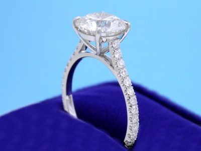 Custom 18-karat white-gold mounting with 26 French cut pave set round brilliant cut diamonds