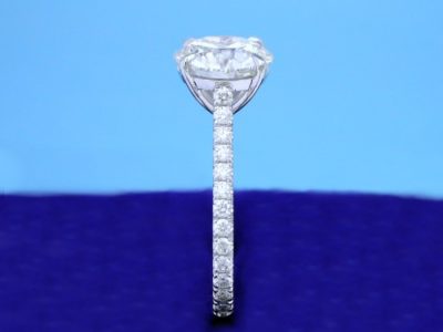 Custom 18-karat white-gold mounting with 26 French cut pave set round brilliant cut diamonds