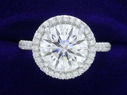 2.51 carat Round Brilliant Cut diamond graded F color and VS2 clarity in platinum 0.32 tcw pave halo and shank mounting