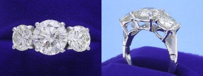 Round Diamond Ring: 3.00 carat Three-Stone with 2.54 tcs Round Side Diamonds